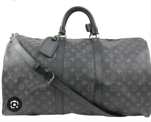 Louis Vuitton Black
Monogram Eclipse Keepall.